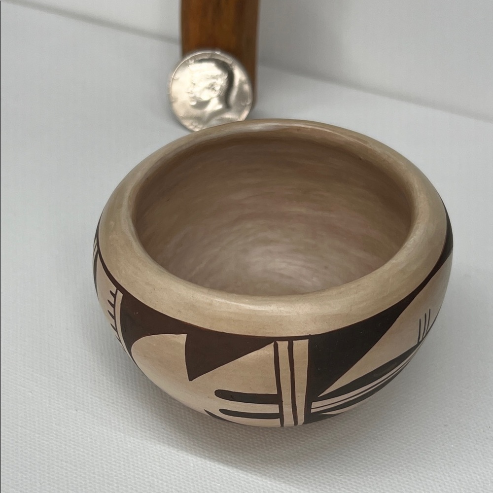 Handcrafted Hopi pottery bowl with tradition designs.